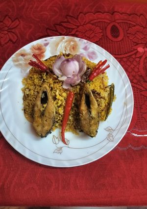 A picture of Brown Rice Hilsa Biryani.