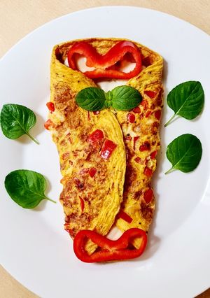 Una foto de Omelette de morrón rojo y queso fresco