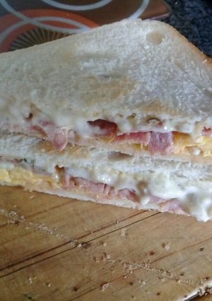 A picture of Bacon and egg deluxe sandwich.
