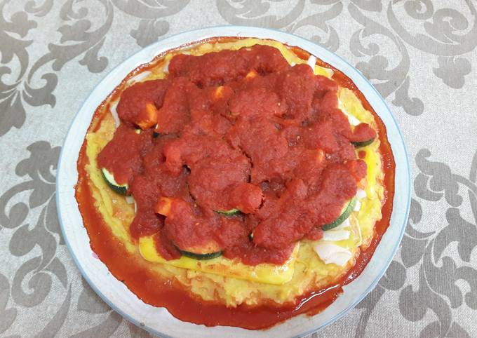 Foto principal de Polenta-pizza sin gluten vegana
 🍕