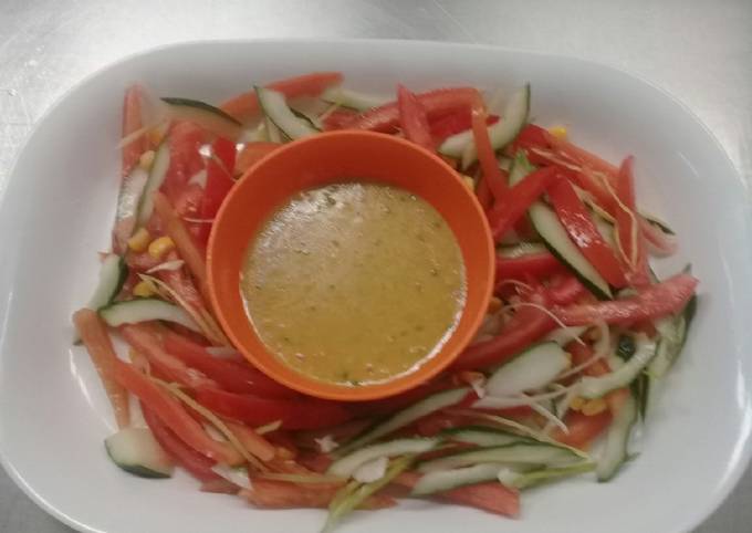 Fresh garden salad in vinegrate dressing/sauce