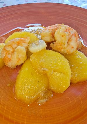 Foto principal de Patatas confitadas al aroma de langostinos al ajillo