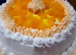 Una foto de Pastel tres leches de durazno 🎂