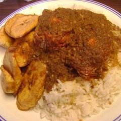 A picture of Peppered Stew with White Rice & Fried Plantain.