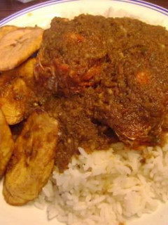A picture of Peppered Stew with White Rice & Fried Plantain.