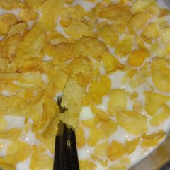 A picture of Milk with Corn flakes.