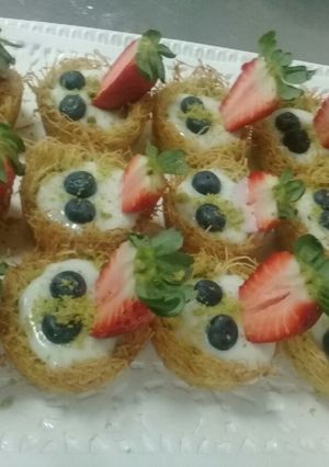 A picture of Konafah pistacio with cream.