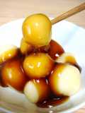 Japanese dessert Mochi with sweet soy starchy sauce