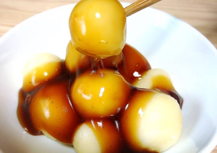 Japanese dessert Mochi with sweet soy starchy sauce