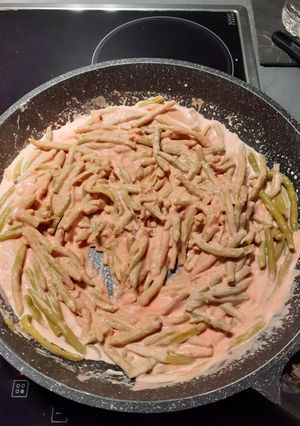 Une photo de Haricots verts à la sauce tomate