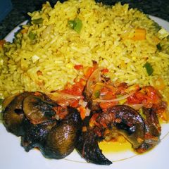 A picture of Fried rice n Peppered snail.