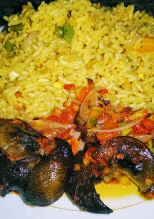 A picture of Fried rice n Peppered snail.
