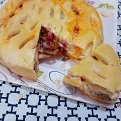 Seekh kabab stuffed pizza pie in pateela 👍👌 A picture of Seekh kabab stuffed pizza pie in pateela 👍👌.