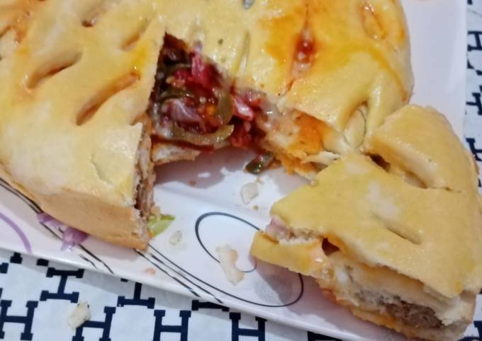 Recipe of Award-winning Seekh kabab stuffed pizza pie in pateela 👍👌