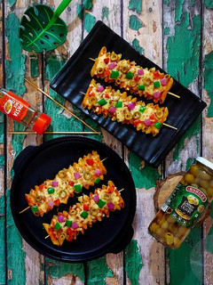 A picture of Cheesy Pasta Sticks.