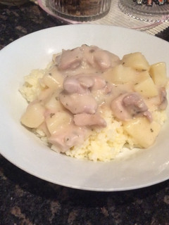 A picture of Creamy mushroom chicken with butter rice.