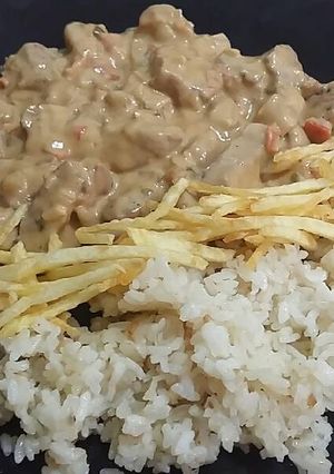 Foto principal de Solomillo en salsa patatas chips y arroz