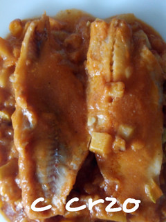 Una foto de Abadejo con calabacín, tomate y cebolla