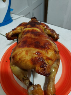 Una foto de Pollo rostizado al Mezcal