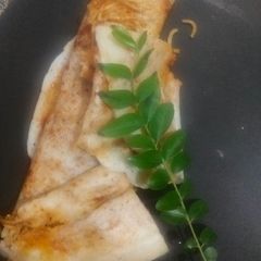 A picture of Schezwan noodles dosa.