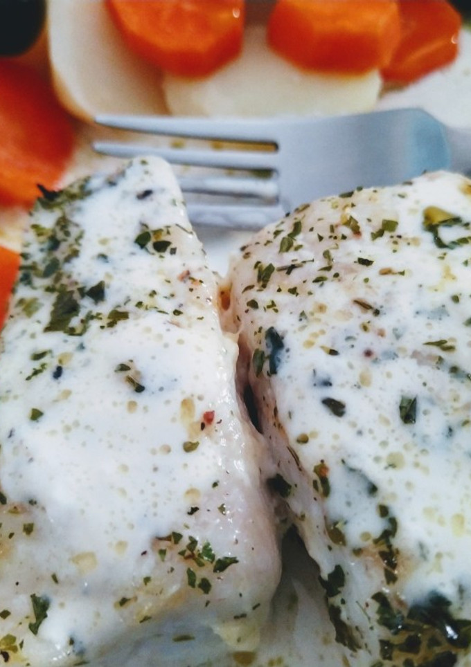 Una foto de Merluza con nata y perejil