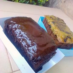 A picture of Chocolate banana loaf with chocolate ganache.