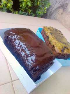 A picture of Chocolate banana loaf with chocolate ganache.