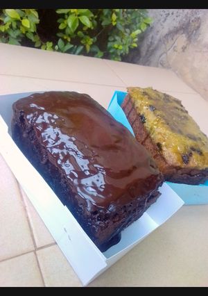 A picture of Chocolate banana loaf with chocolate ganache.