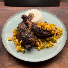 A picture of Jerk Chicken with Mango Salsa.