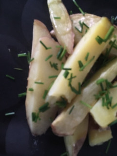 Una foto de Papas al horno con ciboullete