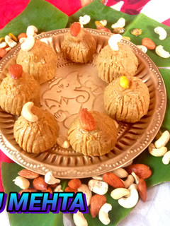 बेसन और मिल्क पाउडर का मोदक रेसिपी मुख्य फोटो