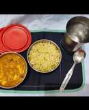 Hing khichdi with white peas, potato and paneer curry