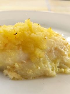Una foto de Bacalao al horno con mahonesa y cebolla