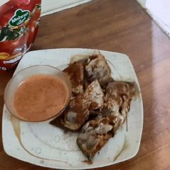 A picture of Fish with sauce.