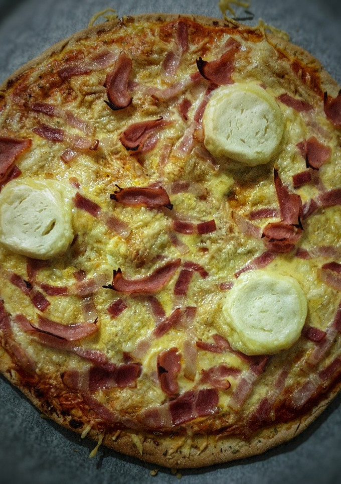 Una foto de Pizza "americana"