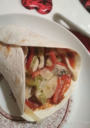 Una foto de Burrito de pollo y verdura
