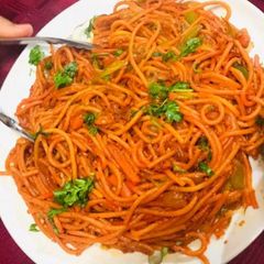 A picture of Stir fried sezwan noodles.