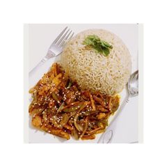 A picture of Chinese style chicken and veggies with brown rice.