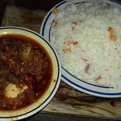 A picture of White with carrots and stew with eggs.
