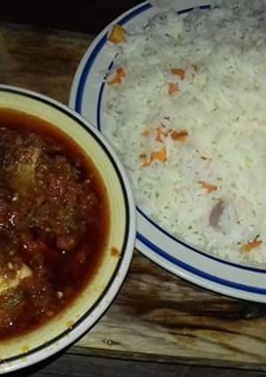 A picture of White with carrots and stew with eggs.