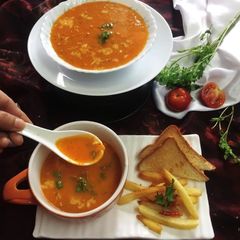 Cheesy grilled tomato soup A picture of Cheesy grilled tomato soup.