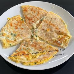 A picture of Double Multiseed Tortilla with Cheese and Eggs.