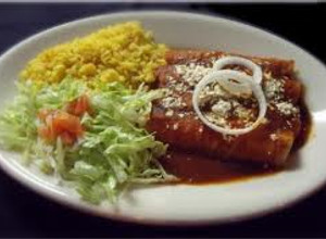 Una foto de Enchiladas de mole oaxaqueño