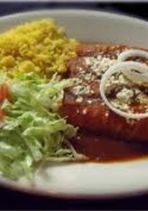 Una foto de Enchiladas de mole oaxaqueño