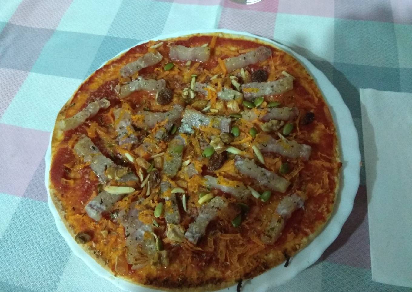 Pizza de bacon con frutos secos