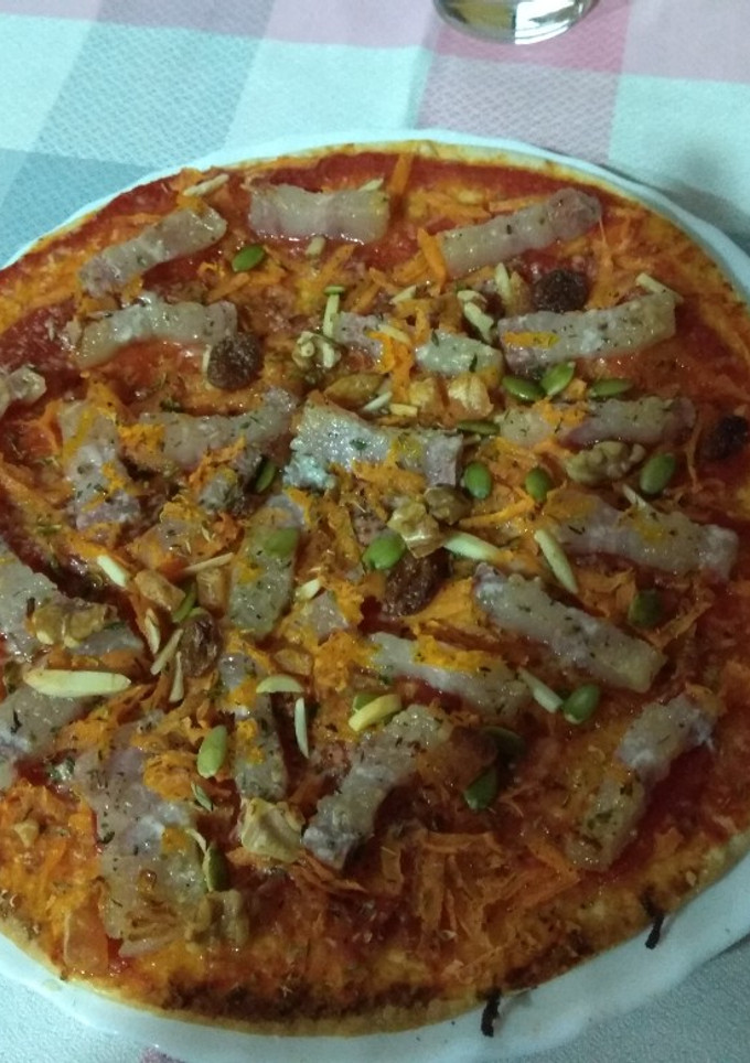 Una foto de Pizza de bacon con frutos secos
