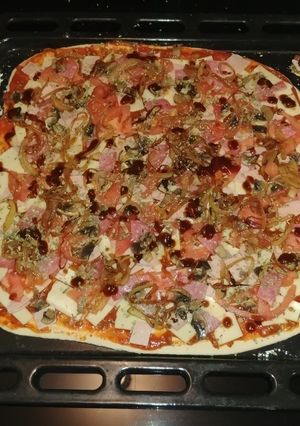 Una foto de Pizza antojo de cuarentena