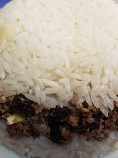 Una foto de Arroz tapado