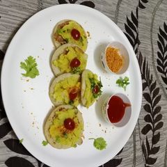 A picture of Mini moong dal masala dosa.