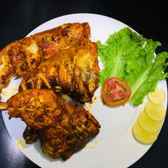 Spicy grilled chicken tikka A picture of Spicy grilled chicken tikka.